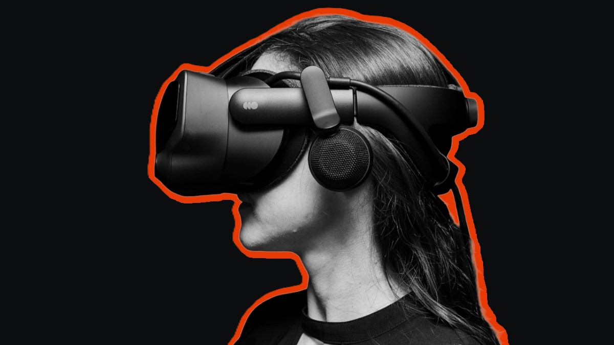 A woman watching Female POV VR porn in her Valve Index.